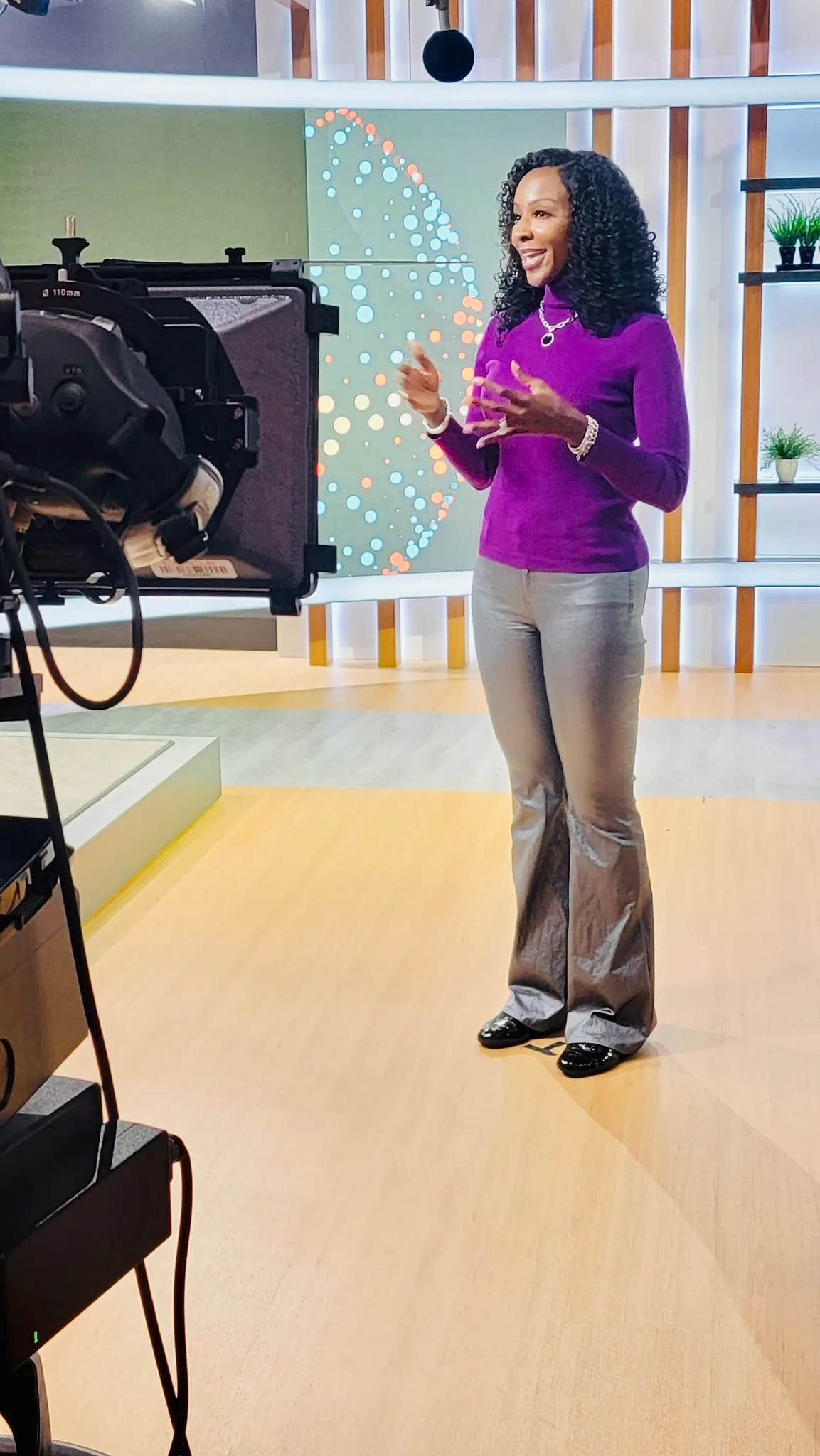 Kay Malcolm presenting in the Oracle TV studio