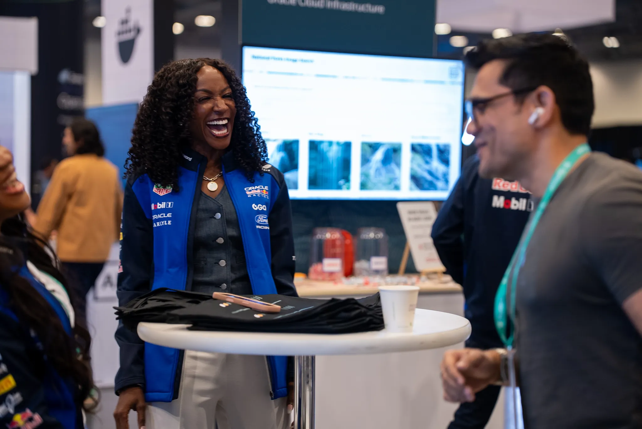 Kay Malcolm with attendees at the Oracle booth, AI Engineer World’s Fair